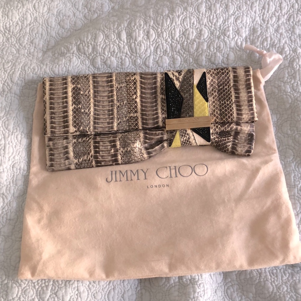 Jimmy choo snake embossed with crystal design clutch